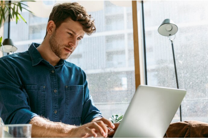 Man using a LapTop.